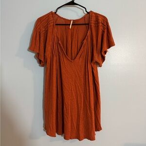 Free people burnt orange flowy blouse size M